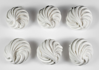 Sweet white meringue isolated on white background