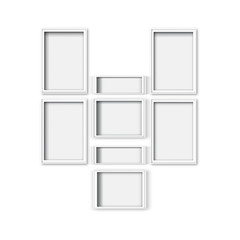 blank picture frame template set isolated on wall