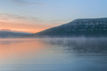 Misty morning on the river Dniester in Bakota. Dniester Canyon, Ukraine.