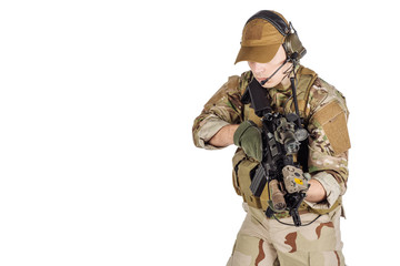 Portrait soldier or private military contractor holding automatic rifle. war, army, weapon, technology and people concept. Image on a white background.