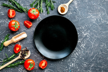 restaurant kitchen with tomato and rosemary on gray background top view mock-up
