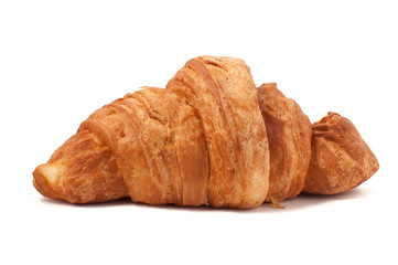 Fresh and tasty croissant over isolated white background