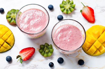 Blueberry mango strawberry kiwi banana greek yogurt smoothies