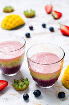 Blueberry mango strawberry kiwi banana greek yogurt smoothies