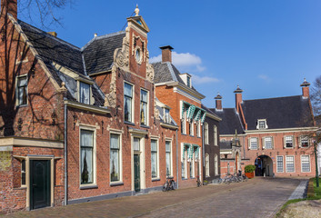 Fototapeta premium Street with old houses in the historical center of Groningen