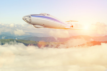 Big passenger airplane in the clouds. travel by air transport