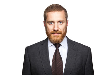 Bearded businessman looking at camera. studio shot isolated on white.