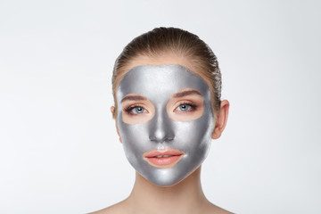 Woman portrait skin care health healthy silver mask close up white