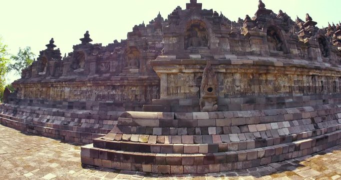 Candi Bororbudur ancient monument and Buddhist temple, exploring ruins of old traditional pagoda. Culture and heritage site in Java, Indonesia