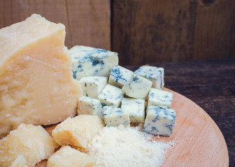 Grated Parmesan and sliced Blue cheese