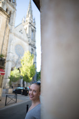 Portrait of a young woman walking in streets