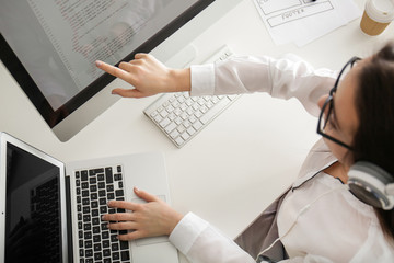 Woman programmer working at office