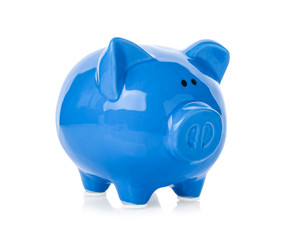 Blue ceramic piggy bank on white background