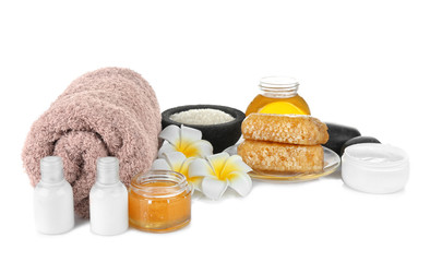 Obraz na płótnie Canvas Spa setting with nutrient cosmetic and delicious honey on white background