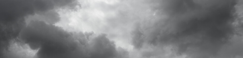 Grey clouds flying over horizon, cloudscape.