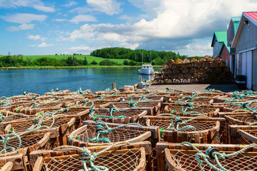 Lobster traps on a wharf in rural Prince Edward Island, Canada. - 142653633