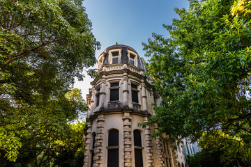 Traditional classic old architecture houses and green trees in Palermo Chico neighborhood, Buenos...