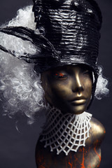 Mannequin in black head-wear