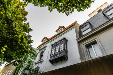 Traditional classic old architecture houses and green trees in Palermo Chico neighborhood, Buenos...