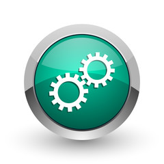 Gear silver metallic chrome web design green round internet icon with shadow on white background.