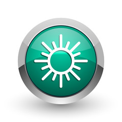 Sun silver metallic chrome web design green round internet icon with shadow on white background.