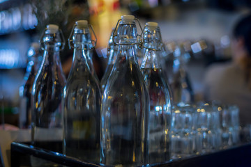 Display of empty glass bottles