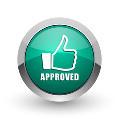 Approved silver metallic chrome web design green round internet icon with shadow on white background.
