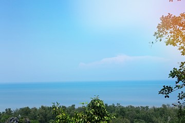 Tropical ocean view on the hills and blue sky abstract background