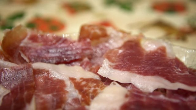 4K People Eating Iberian Ham Dish On The Table, Traditional Spanish Food-Dan
