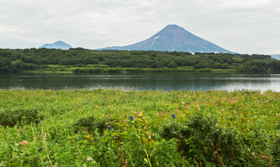 Fototapeta premium Ilyinsky stratovolcano near Kurile Lake.