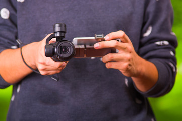 Hand held camera stabilizer for cell phone