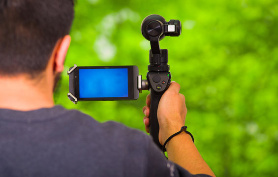 Hand held camera stabilizer for cell phone