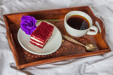 Breakfast in bed. Cup, coffee, red, velvet, cake and flower