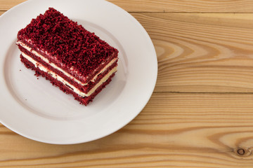 red velvet slice of cake on white plate
