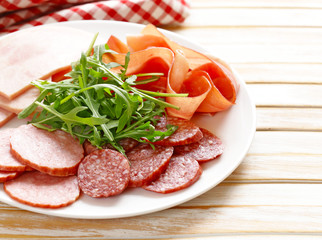 Assortment of meat delicacies (salami, parma, ham)
