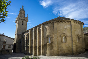 Fototapeta na wymiar Southern facade of the Church of Santa Maria, in Uncastillo, Zaragoza, Aragon, eastern Spain. It was built between 1135 and 1155 in Romanesque style
