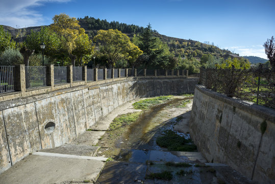 Canalization of the river Riguel on its course through Uncastillo, Zaragoza, Aragon, eastern Spain
