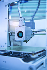 3D printer on a blue background