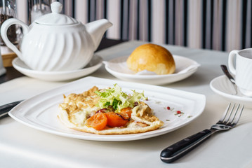 omelet with vegetables and ham