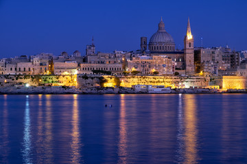 Fototapeta na wymiar The night view of Valletta skyline from Sliema. Malta