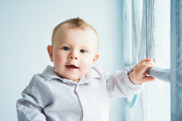 Portrait of happy joyful beautiful little boy
