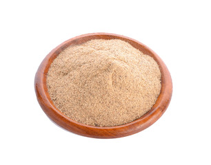 Pepper powder in wood plate on white background