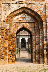 Arched red stone doorways in Dehli