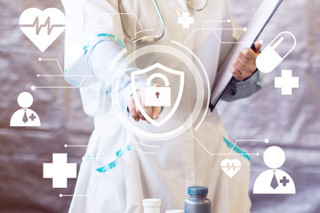 Fototapeta premium Doctor pushing button locked shield virus security virtual healthcare network
