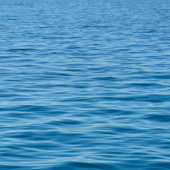 Silky texture blue surface of the Mediterranean Ocean.