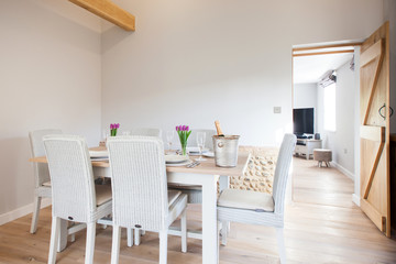 table setting with tulips in bright kitchen