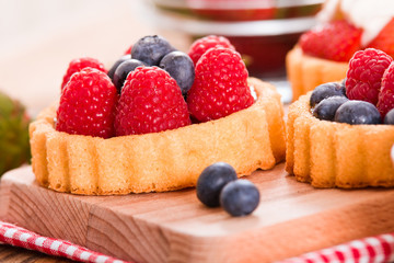 Tartlets with forest fruits. 