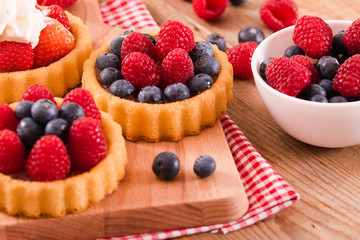 Tartlets with forest fruits. 