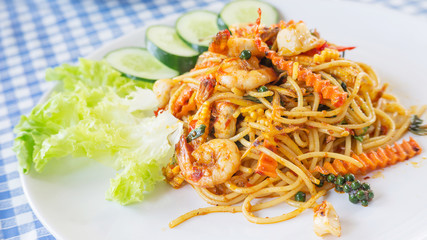 spicy stir-fried spaghetti with prawn, (Thai food).