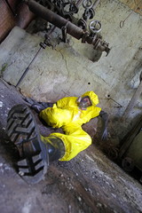industrial accident victim lying at the wall